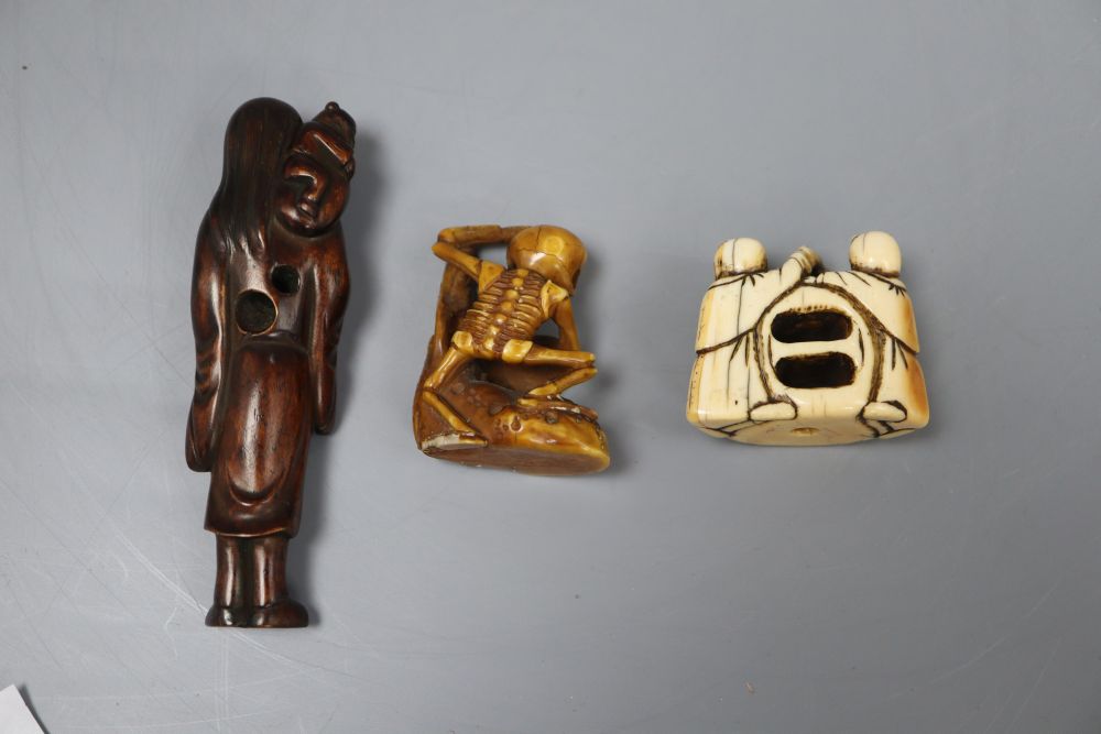 Two Japanese ivory netsuke/okimono carvings and a hardwood figural netsuke, longest 9cm